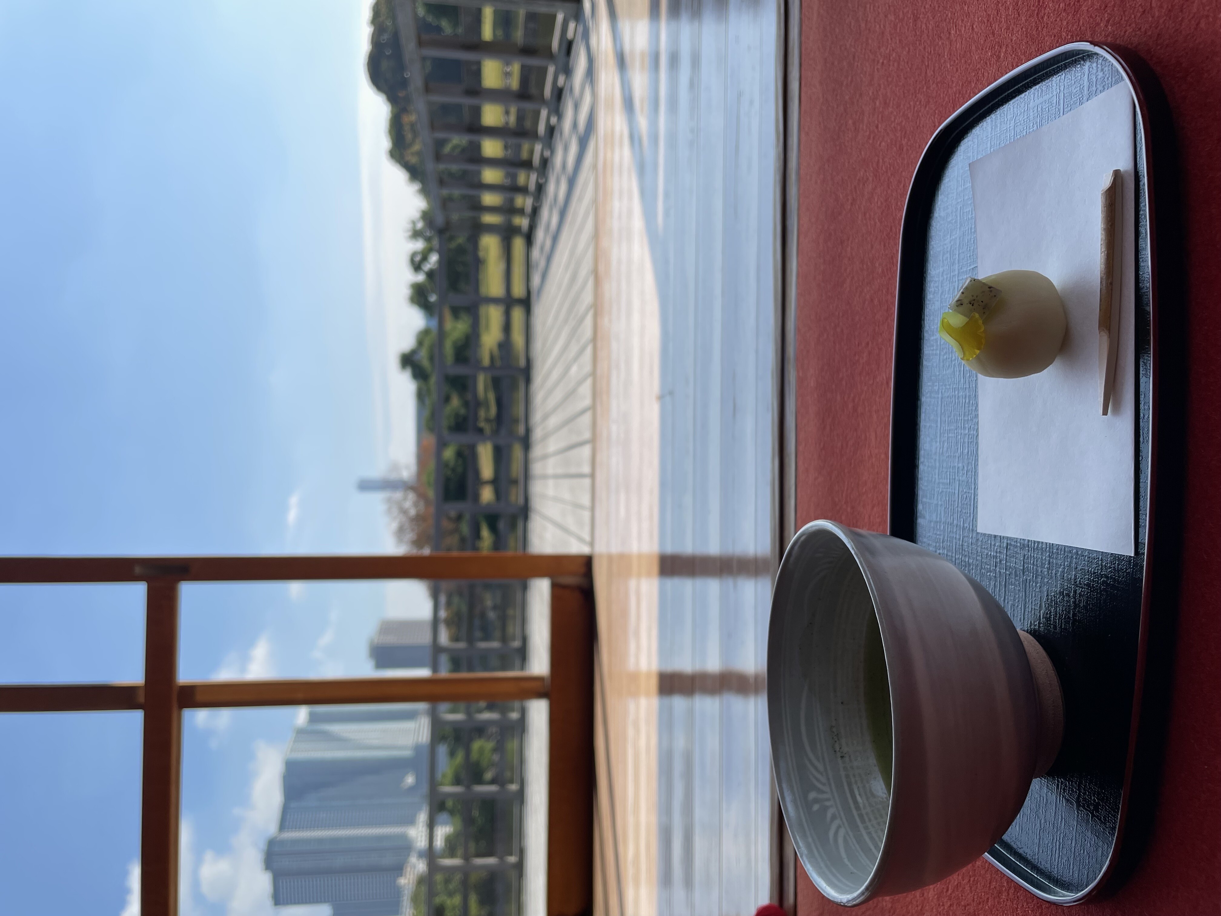 Matcha with wagashi by the window